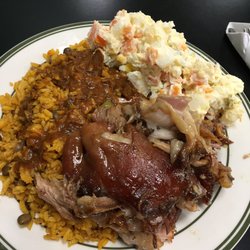 Pernil, potato salad & moro de gandules with sauce from beef stew