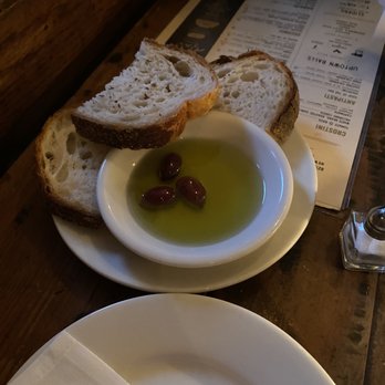 Saggio - Complementary bread and Kalamata olive oil - Italian Near Me - New York, New York Saggio - Complementary bread and Kalamata olive oil - Italian Near Me - New York, New York