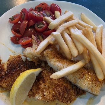 The City Fish - Chilean sea bass with French fries and basil tomato - Sandwiches Near Me - Cupertino, California The City Fish - Chilean sea bass with French fries and basil tomato - Sandwiches Near Me - Cupertino, California