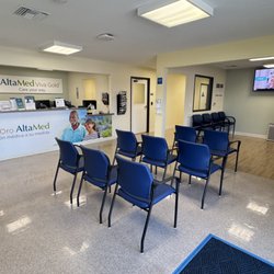 AltaMed Medical Group - An interior view of the waiting lobby and check-in area.