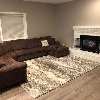 Paul's Precision Painting - Paul painted the brick and now the ugly fireplace is an amazing focal point. Superb quality work - Painters Near Me - Boise, Idaho