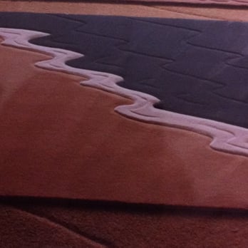 Howe Floors - a picture of a bathroom floor - Carpeting Near Me