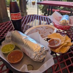 Taqueria Mi Familia - Chips and salsa Regular Chile Verde burrito, no beans. Regular burritos include your choice of meat, rice, beans, and salsa.