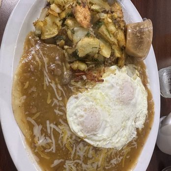 Rodeo Cafe - Huevos rancheros with red rojo sauce, over easy eggs, rodeo potatoes, and beans - Cafes Near Me - Rancho Cucamonga, California
