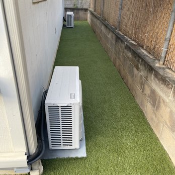 Hapa Landscaping - After synthetic grass installed. Grass placed between ac condenser and wall. Small detail but it makes a big difference. - Landscaping Near Me - Honolulu, Hawaii Hapa Landscaping - After synthetic grass installed. Grass placed between ac condenser and wall. Small detail but it makes a big difference. - Landscaping Near Me - Honolulu, Hawaii