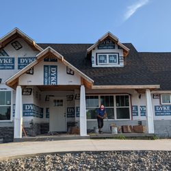 KC Seamless - The start of an all white siding new construction.