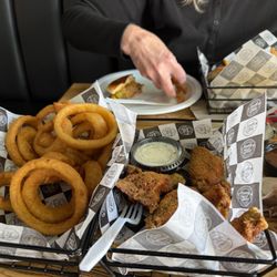 Happy Place Eatery - Rings, lemon-pepper wings.