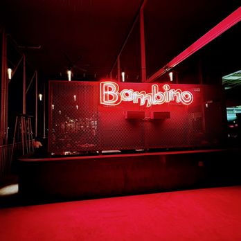 Bambino - Large covered patio behind the sign - Pizza Near Me - Austin, Texas