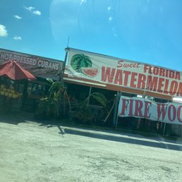 a sign for a firewood store a sign for a firewood store