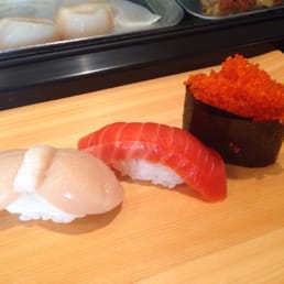Scallop, wild salmon, tobiko sushi. Scallop, wild salmon, tobiko sushi.