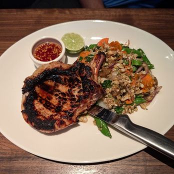 Yard House - Thai grilled pork chop with cauliflower fried rice - New American Near Me - Henderson, Nevada