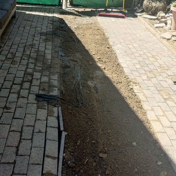 Ray's Plumbing - Access path inside our yard and replacement of main copper pipe from street to home replaced with 1inch flex pipe - Plumbing Near Me