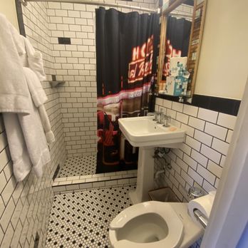 El Rancho Hotel - Bathrooms are small but clean. Tip: drape a hand towel over the sink to use as a shelf - that way you won't drop your makeup in the toilet. - Hotels Near Me - Gallup, New Mexico