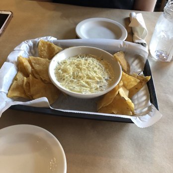 Twin Archer Brewpub - Delicious spinach and artichoke dip with homemade tortilla chips - American Near Me - Muncie, Indiana