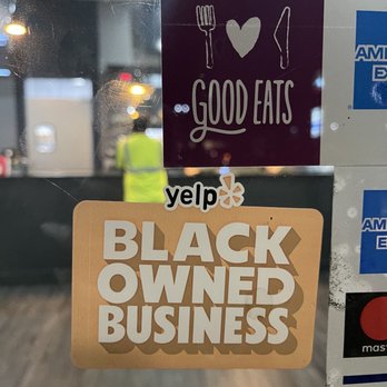 Jamaican Rhythm - a sign that says yelp black owned business - Caribbean Near Me - Baldwin, New York