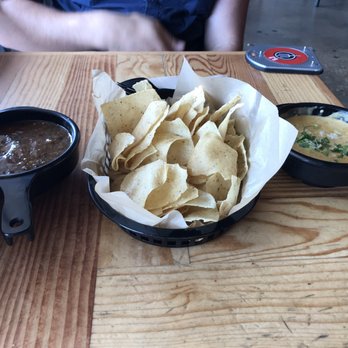 Torchy's Tacos - Green Chile Queso Chips - Full Order, side of roja salsa - Tex-Mex Near Me - Dallas, Texas Torchy's Tacos - Green Chile Queso Chips - Full Order, side of roja salsa - Tex-Mex Near Me - Dallas, Texas