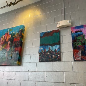 Tasty Burger - Art along the wall. This place has a very upbeat vibe going - Burgers Near Me - Boston, Massachusetts Tasty Burger - Art along the wall. This place has a very upbeat vibe going - Burgers Near Me - Boston, Massachusetts