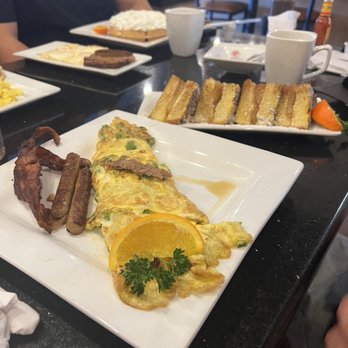 Keke's Breakfast Cafe - Cheese steaks omelette sausage and bacon. Apple cinnamon stuffed French toast - Breakfast & Brunch Near Me - Windermere, Florida Keke's Breakfast Cafe - Cheese steaks omelette sausage and bacon. Apple cinnamon stuffed French toast - Breakfast & Brunch Near Me - Windermere, Florida