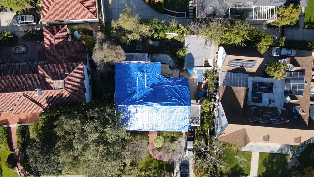 Slide of Rafael and Iris Roofing