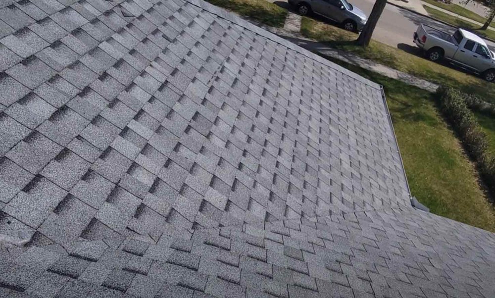 Slide of Legends Roofing Company