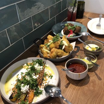 Galit - Carrots, fried fish Tunisian style and falafel - Mediterranean Near Me - Chicago, Illinois