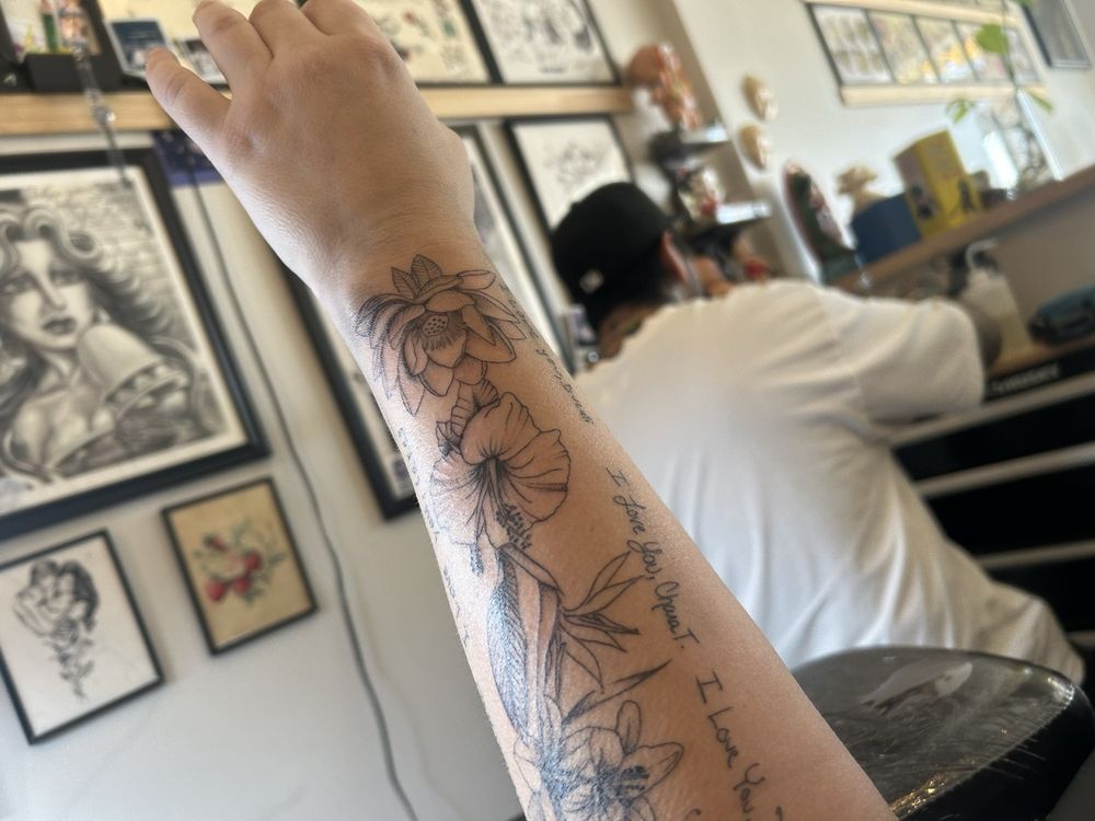Last Laugh Tattoo Logo