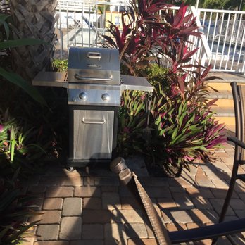 Westwinds Waterfront Resort - Grills are available in the outdoor waterfront common area - Hotels Near Me - Treasure Island, Florida