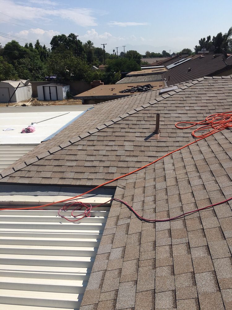 Slide of Thompson Roofing