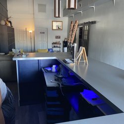 SukhaLife Yoga Studio - Front desk and cubbies that leads into studio. Kombucha taps too.