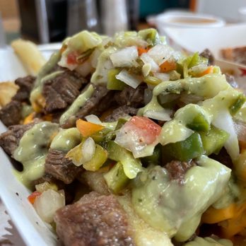 Califas - Close up of the carne asada fries - Desserts Near Me - Greenville, South Carolina Califas - Close up of the carne asada fries - Desserts Near Me - Greenville, South Carolina