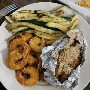 5D Steakhouse - Friend shrimp on a bed of rice with a loaded sweet potato and haystack veggies. - Steakhouses Near Me - Port O'Connor, Texas