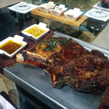 Romantica - Bife con hueso (rib-eye streak with bone in) - Argentine Near Me - Puerto Iguazú, N