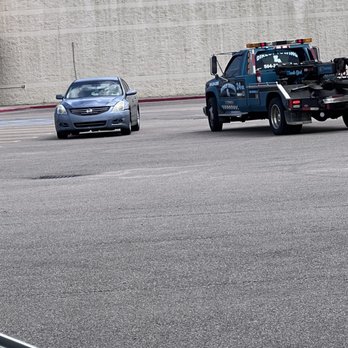 Direct Towing & Roadside Assistance - The two crooks conspiring - Towing Near Me Direct Towing & Roadside Assistance - The two crooks conspiring - Towing Near Me