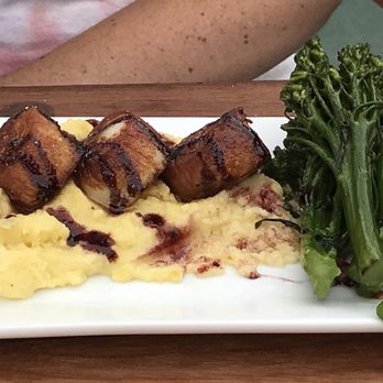 Rockledge Grille - Scallop entree on Creamed Polenta & Blueberry drizzle earned a thumbs up. - Lounges Near Me - West Hartford, Connecticut Rockledge Grille - Scallop entree on Creamed Polenta & Blueberry drizzle earned a thumbs up. - Lounges Near Me - West Hartford, Connecticut