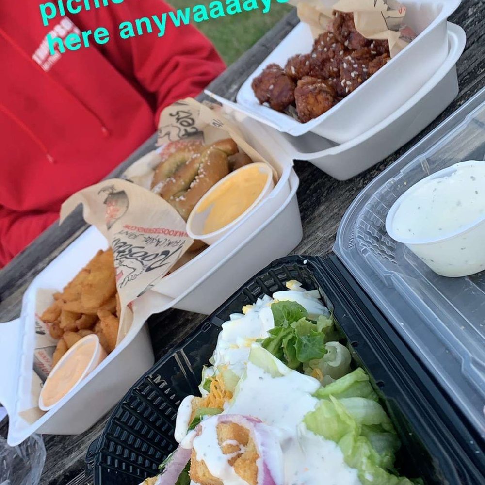 Garden salad, pretzels, onion feathers, and Korean bbq teriyaki wings Garden salad, pretzels, onion feathers, and Korean bbq teriyaki wings