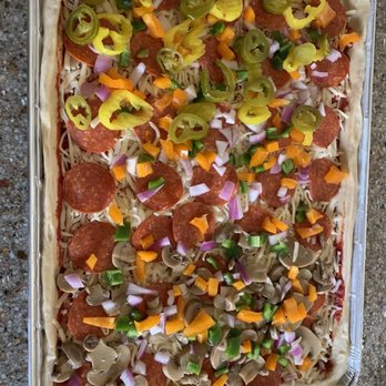 Maria's Market Place - a pizza with pepperoni, peppers, and onions - Convenience Stores Near Me - Canton, Michigan