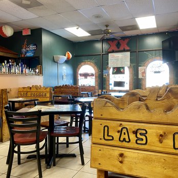 Las Palmas Mexican Restaurant - a woman sitting at a table - Mexican Near Me - Saint Louis, Missouri