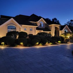 Outdoor Lighting Perspectives of North Sound - Beautiful home with a great lighting design