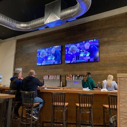 Brick River Cider - Kansas City - Bar with TVs showing NFL games
