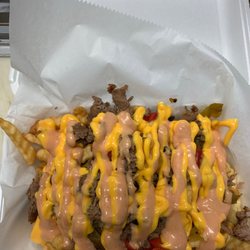 Empanada King - OMG!!! These cheesesteak fries were perfect!!! Not as good as the Buffalo ranch but close!!!