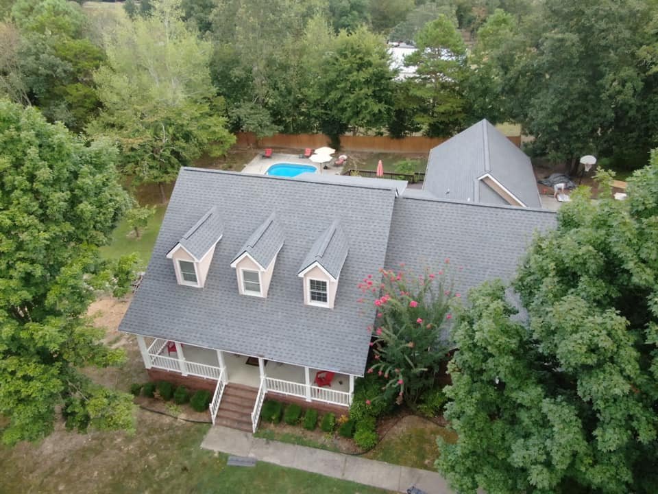 Slide of AMI Roofing