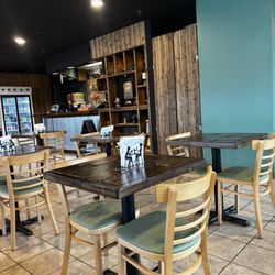 Cafe Luna - The dining area with a view towards the entrance.