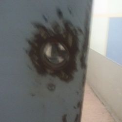 Bartlett House - Notice the chance of being cut and the rust st lock toilet stall door