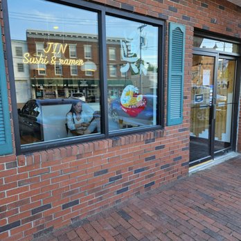 Jin Sushi and Ramen - Hard to see with the reflection, but look for this storefront - Japanese Near Me - Saco, Maine