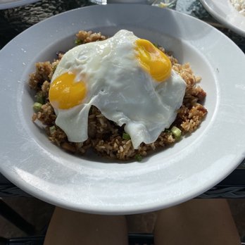 Kula Bistro - Fried rice with Portuguese sausage smoked bacon and ham with sunny side up eggs. - Italian Near Me - Kula, Hawaii Kula Bistro - Fried rice with Portuguese sausage smoked bacon and ham with sunny side up eggs. - Italian Near Me - Kula, Hawaii