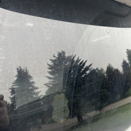 Dirt covered rear windshield after car wash Dirt covered rear windshield after car wash