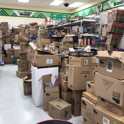 The Mountain of boxes was taller than me and I'm 5 ft tall