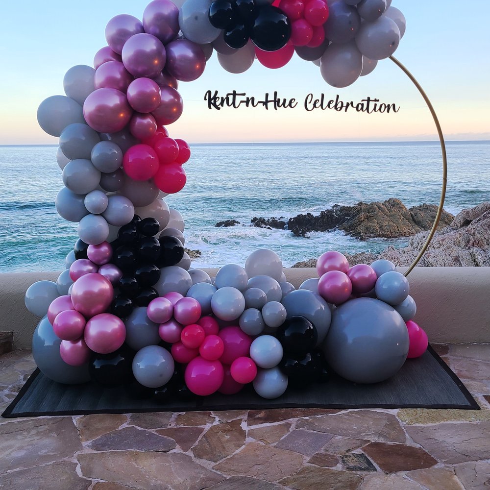 Cabo Linens Things And More - Our photo backdrop right over the rocky beach and ocean.  Our guests loved taking their photos here especially as sunset exploded behind it. - Wedding Planning Near Me - Los Cabos, BCS