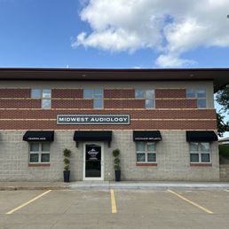 Exterior outside entrance of Midwest Audiology - Front entrance. Looked on the lower level, below New Leaf Wellness. - North Liberty, Iowa Exterior outside entrance of Midwest Audiology - Front entrance. Looked on the lower level, below New Leaf Wellness. - North Liberty, Iowa