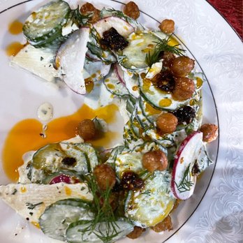 Oma's Hideaway - Market Raita salad - cucumber, apple, radish with yogurt and sichuan chili oil and crispy chickpeas - Asian Fusion Near Me - Portland, Oregon